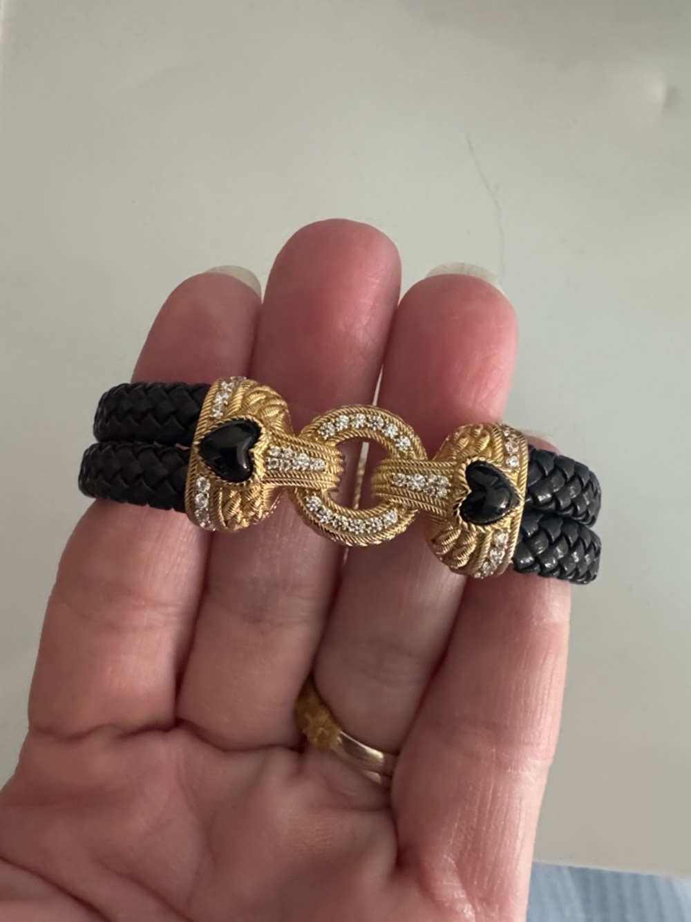 Gold-Tone Black Braided Leather Bracelet with Heart Accents